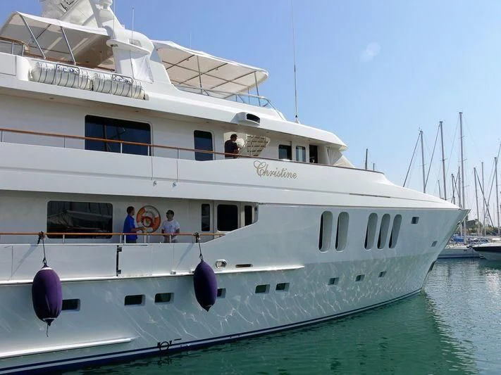 a large white boat with people on it aboard MOATIZE Yacht for Sale