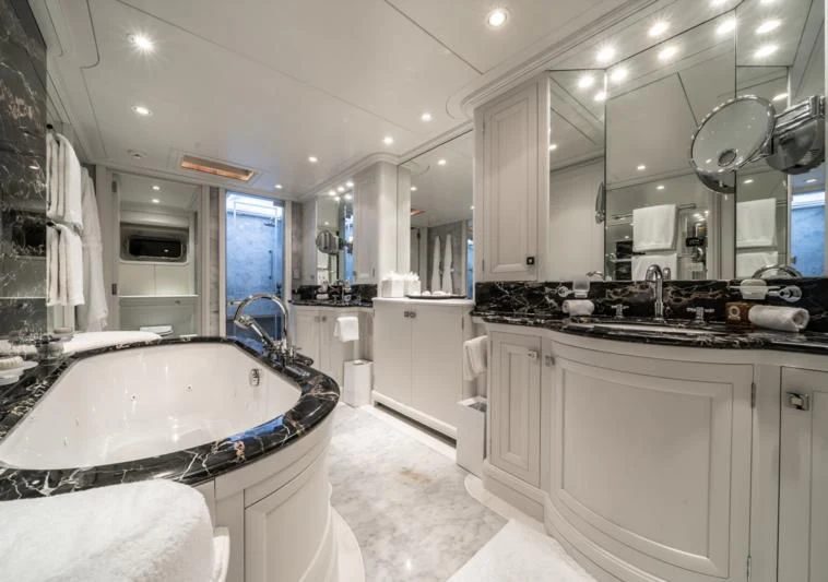 a large bathroom with a large tub aboard MOATIZE Yacht for Sale