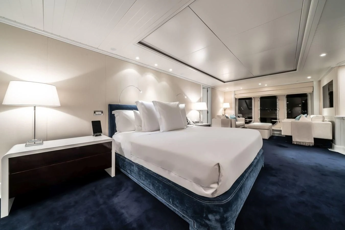 a room with a bed and a chair aboard MOATIZE Yacht for Sale