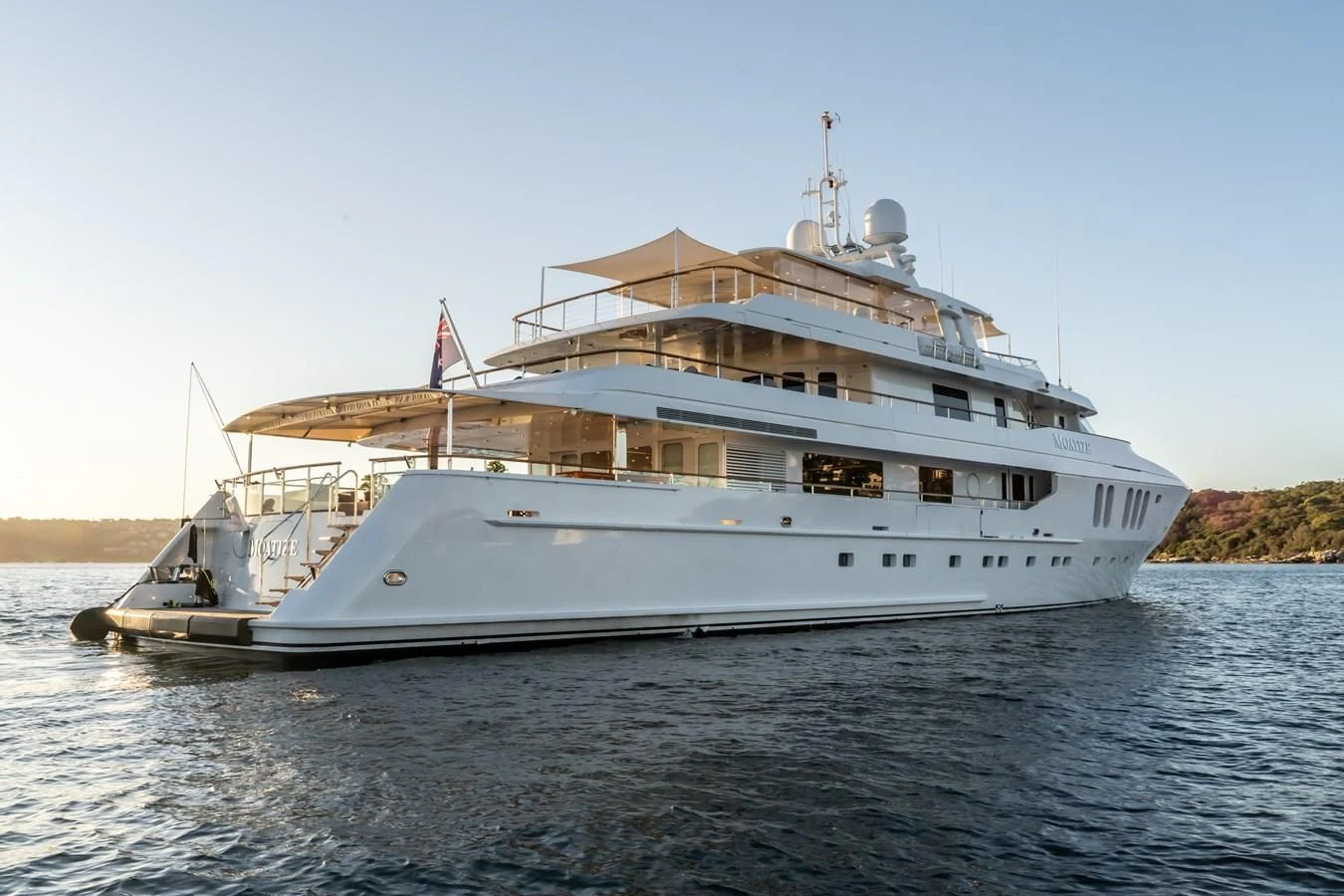 a large white boat on the water aboard MOATIZE Yacht for Sale