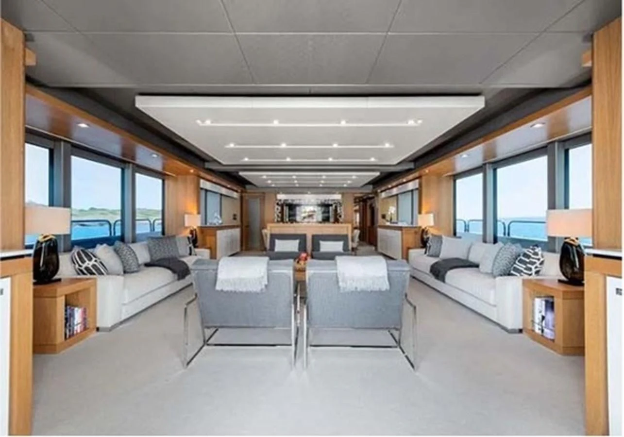 a living room with a large window aboard SUNSEEKER 115 SPORT YACHT Yacht for Sale