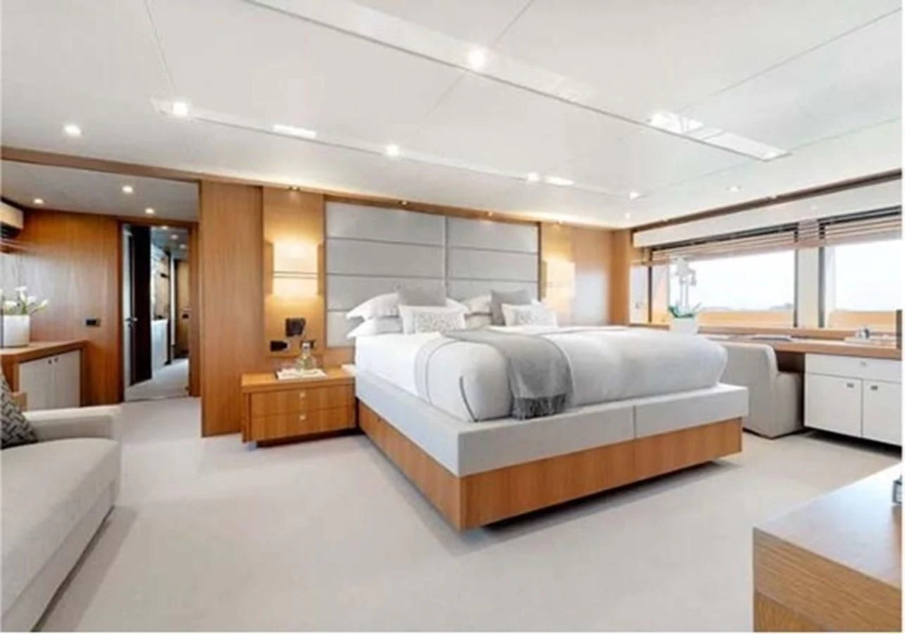 a large bedroom with a large bed aboard SUNSEEKER 115 SPORT YACHT Yacht for Sale