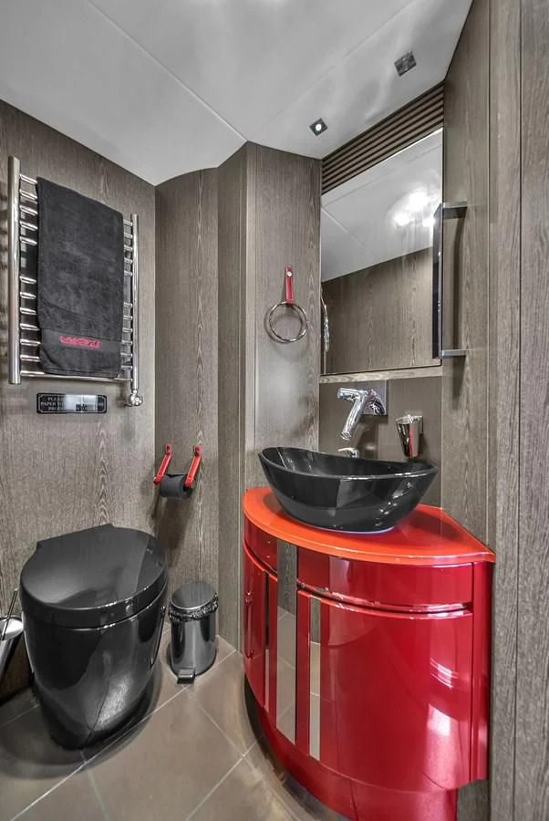 a sink and bucket in a bathroom aboard SUNSEEKER 115 SPORT YACHT Yacht for Sale