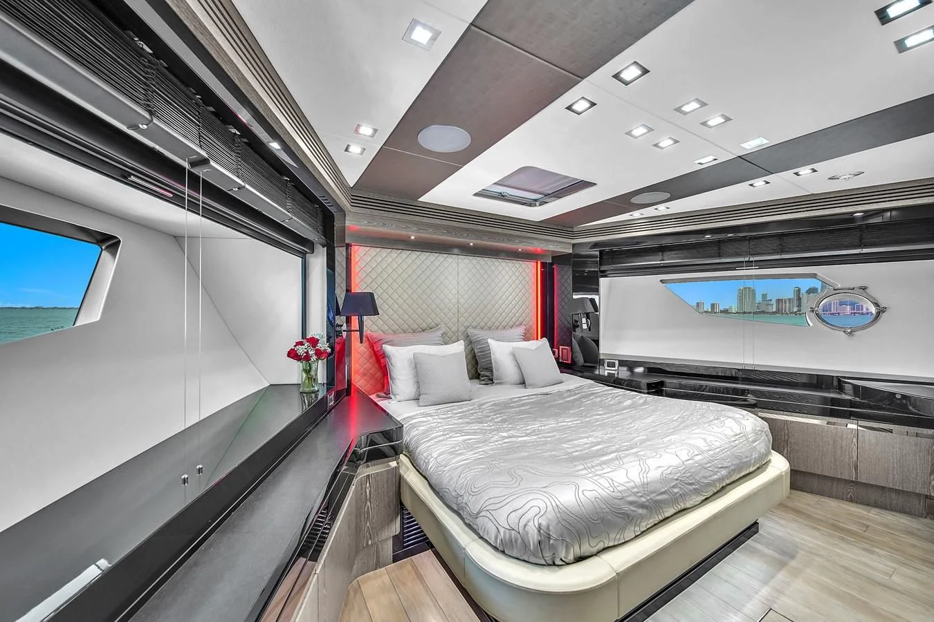 a room with a bed and a tv aboard SUNSEEKER 115 SPORT YACHT Yacht for Sale