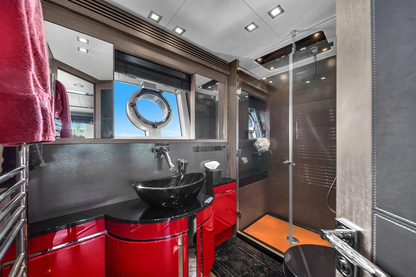 a kitchen with a sink and a large mirror aboard SUNSEEKER 115 SPORT YACHT Yacht for Sale