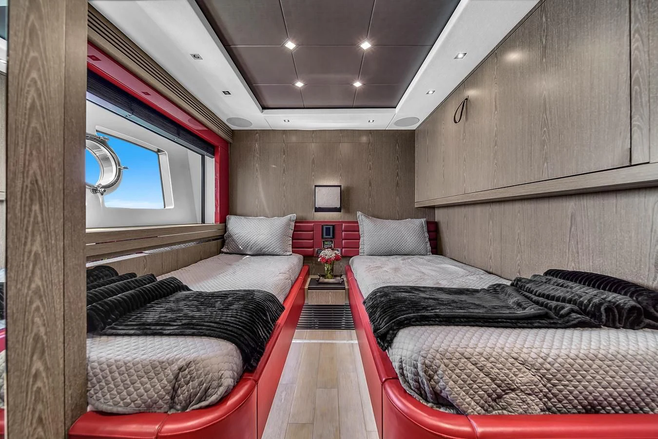 a couple of beds in a room aboard SUNSEEKER 115 SPORT YACHT Yacht for Sale