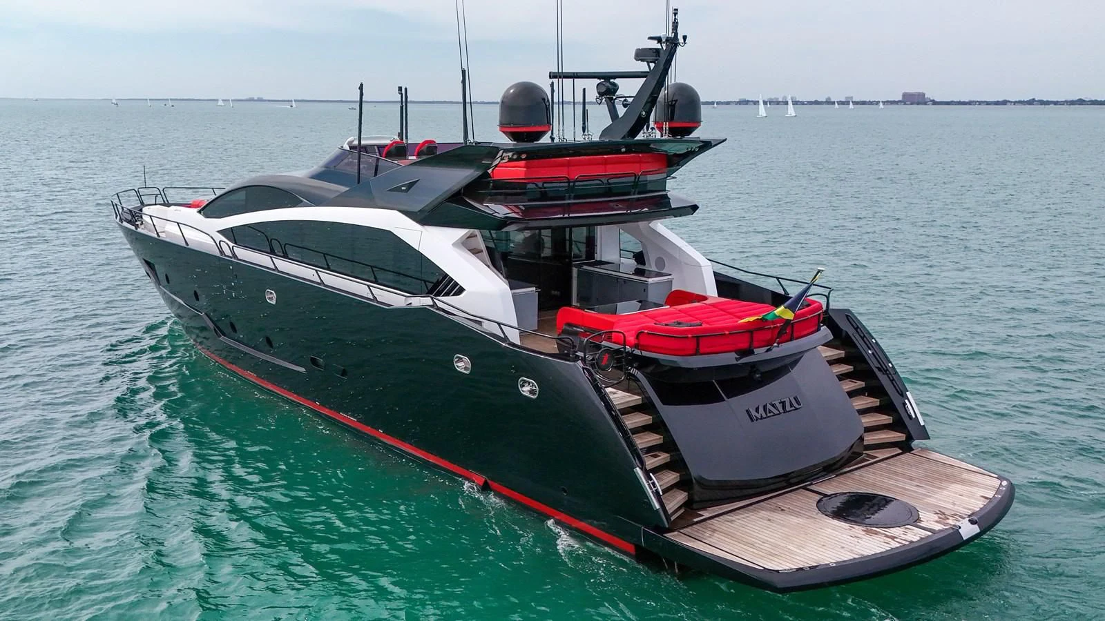a boat on the water aboard SUNSEEKER 115 SPORT YACHT Yacht for Sale
