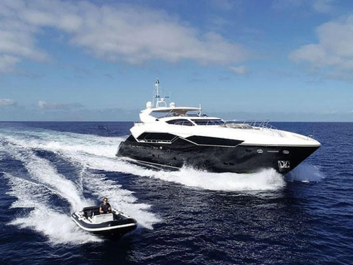 a boat on the water aboard SUNSEEKER 115 SPORT YACHT Yacht for Sale