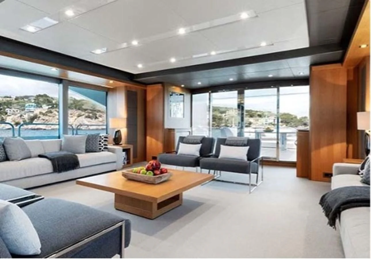 a living room with a large window aboard SUNSEEKER 115 SPORT YACHT Yacht for Sale