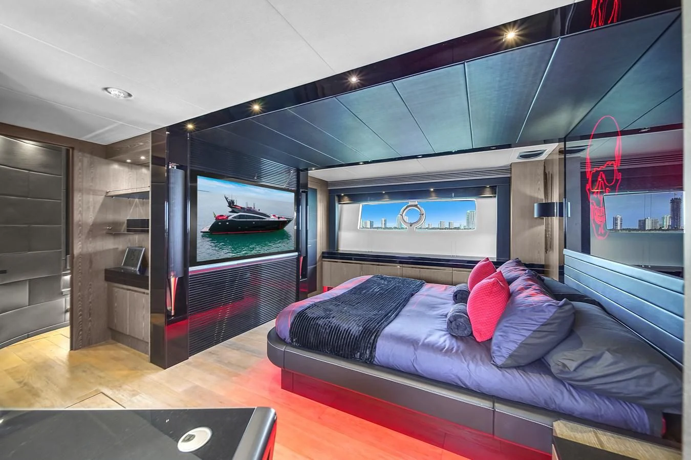 a room with a bed and a desk aboard SUNSEEKER 115 SPORT YACHT Yacht for Sale