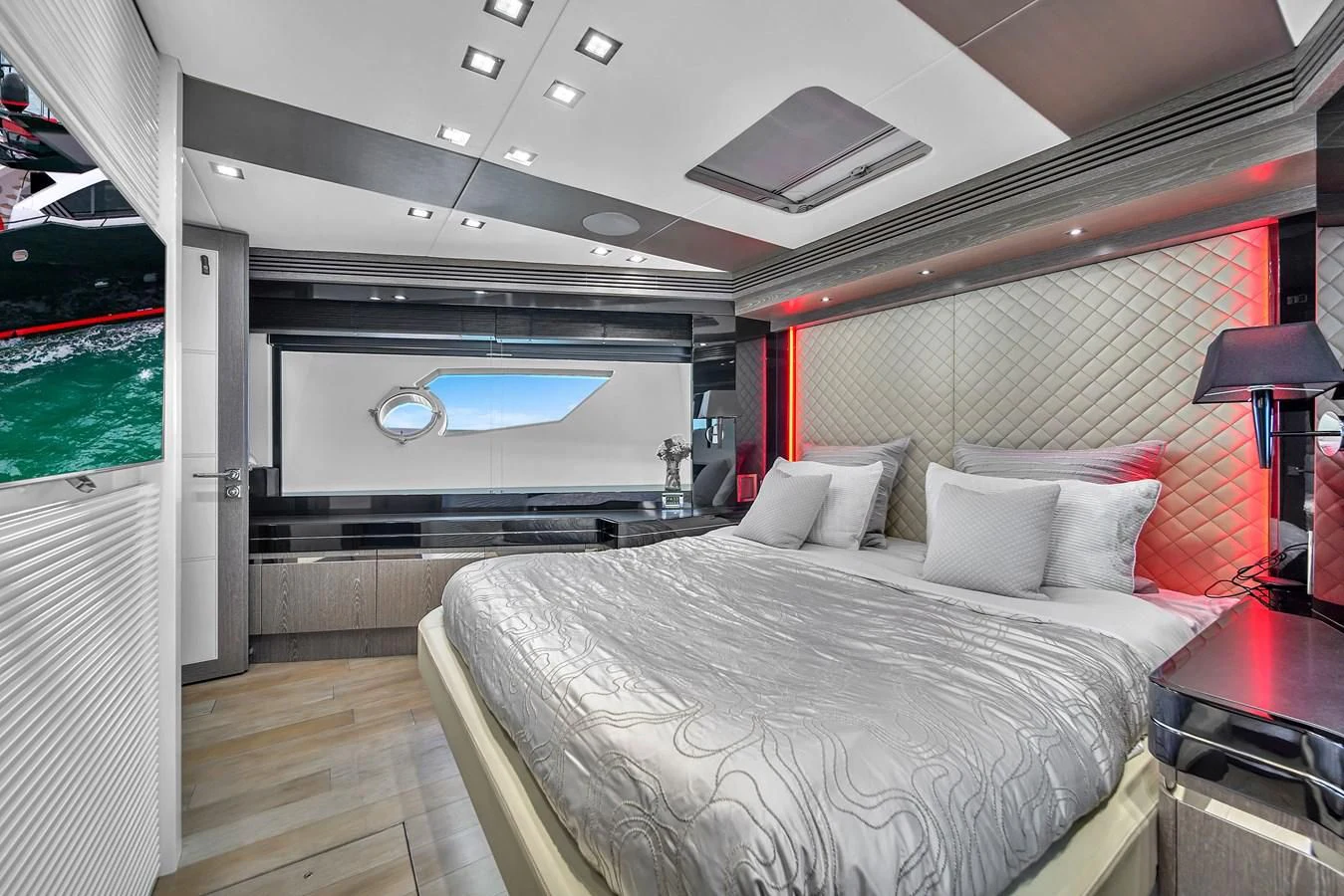a room with a bed and a desk aboard SUNSEEKER 115 SPORT YACHT Yacht for Sale