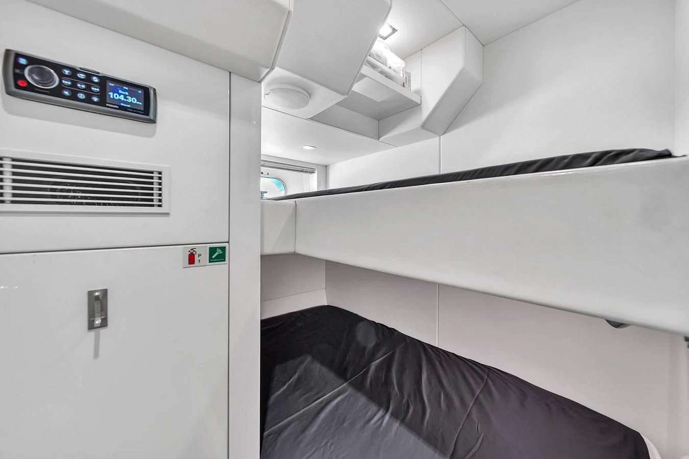 a black object with a screen aboard SUNSEEKER 115 SPORT YACHT Yacht for Sale