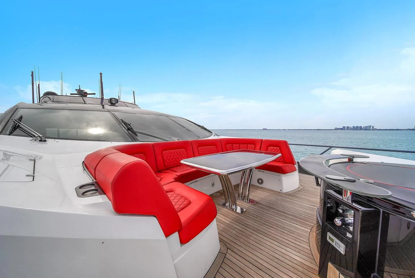 a boat on the water aboard SUNSEEKER 115 SPORT YACHT Yacht for Sale