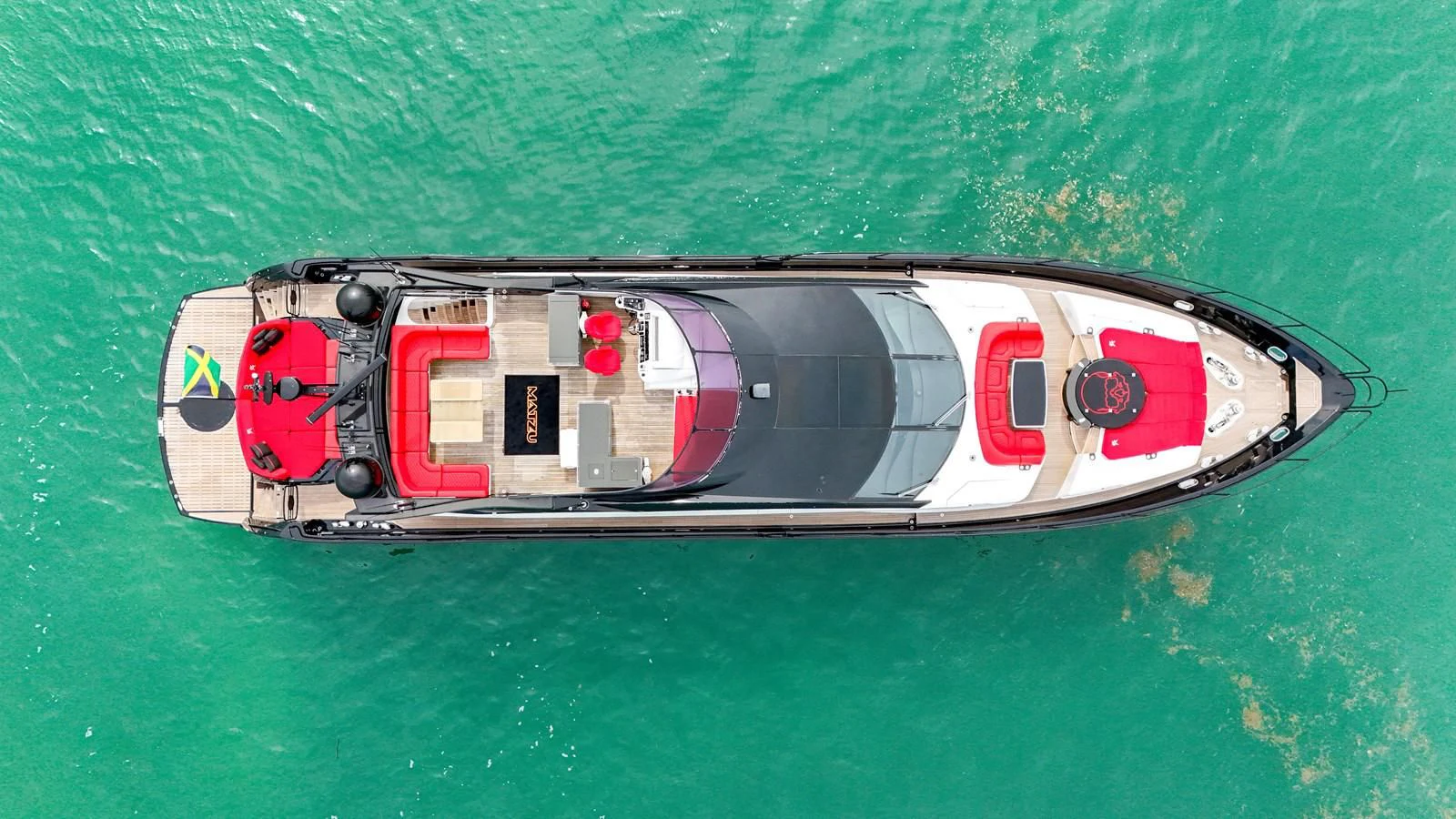 a boat on the water aboard SUNSEEKER 115 SPORT YACHT Yacht for Sale