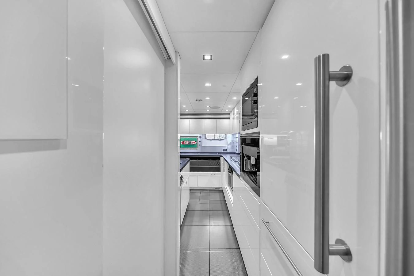 a hallway with doors aboard SUNSEEKER 115 SPORT YACHT Yacht for Sale