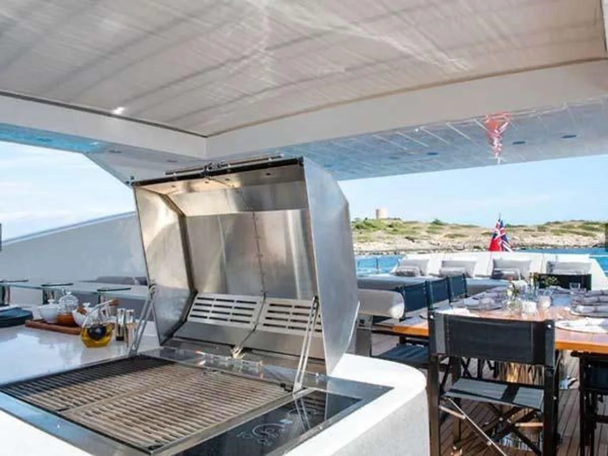 a boat with a large grill aboard SUNSEEKER 115 SPORT YACHT Yacht for Sale
