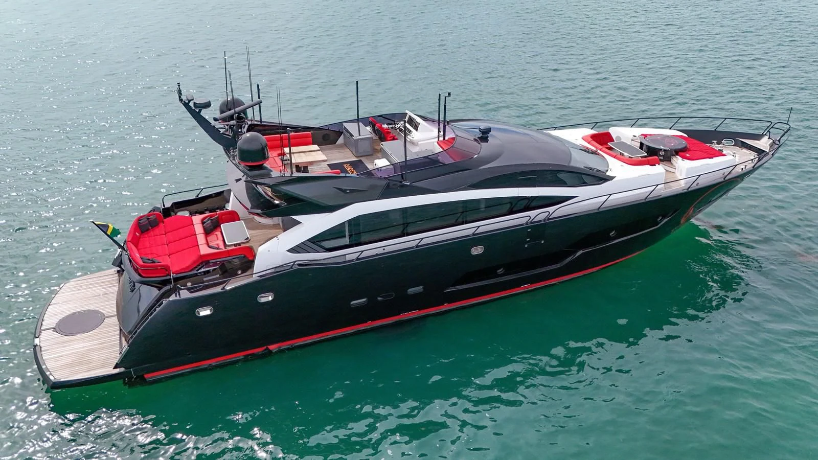 a boat on the water aboard SUNSEEKER 115 SPORT YACHT Yacht for Sale