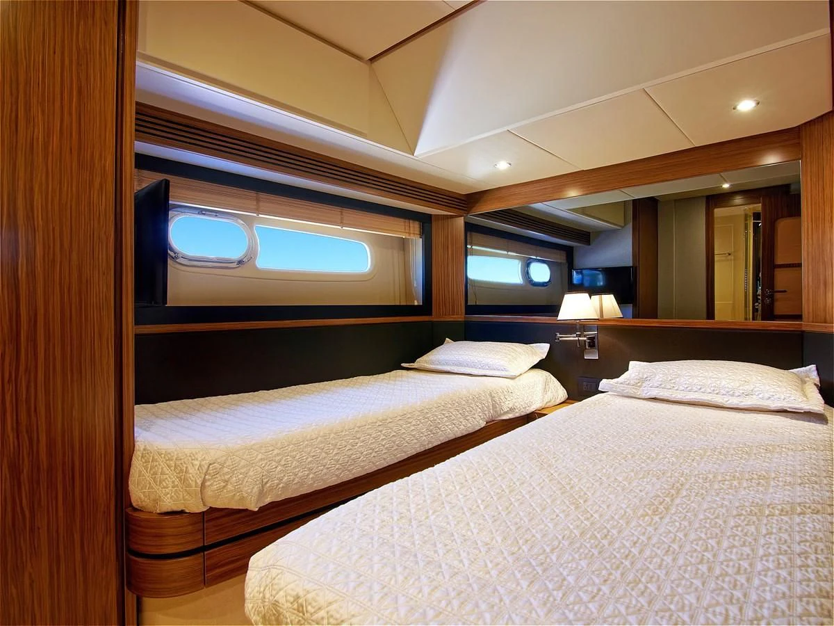 a couple of beds in a hotel room aboard 2017 AZIMUT 66 MAGELLANO Yacht for Sale