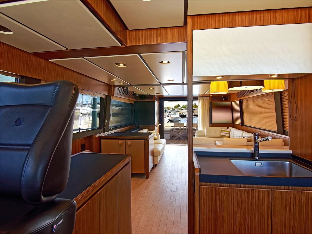 a kitchen with a large window aboard 2017 AZIMUT 66 MAGELLANO Yacht for Sale