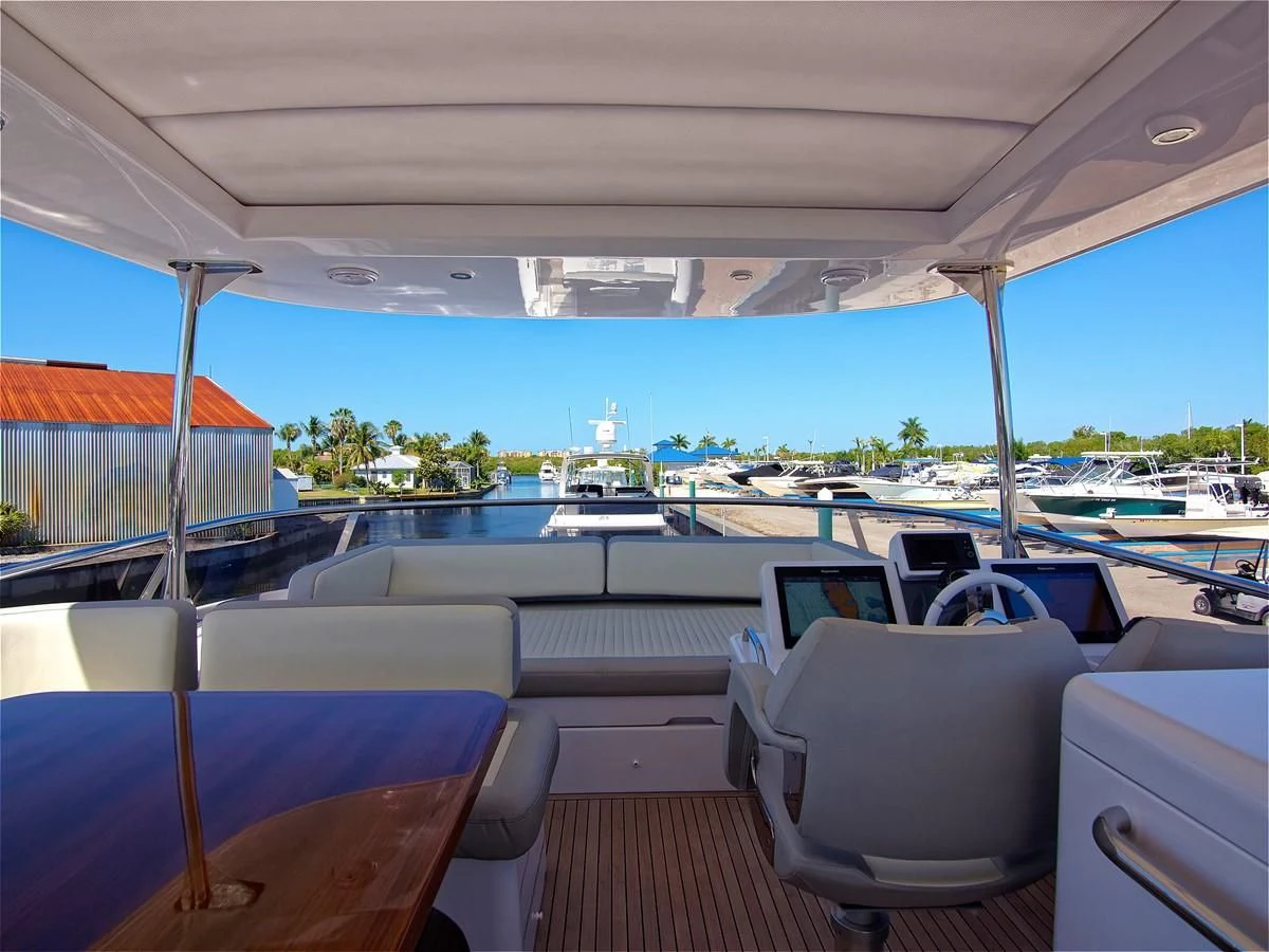 inside of a vehicle with a view of the water and trees aboard 2017 AZIMUT 66 MAGELLANO Yacht for Sale
