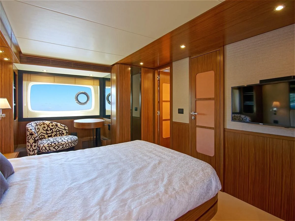 a bed in a room aboard 2017 AZIMUT 66 MAGELLANO Yacht for Sale