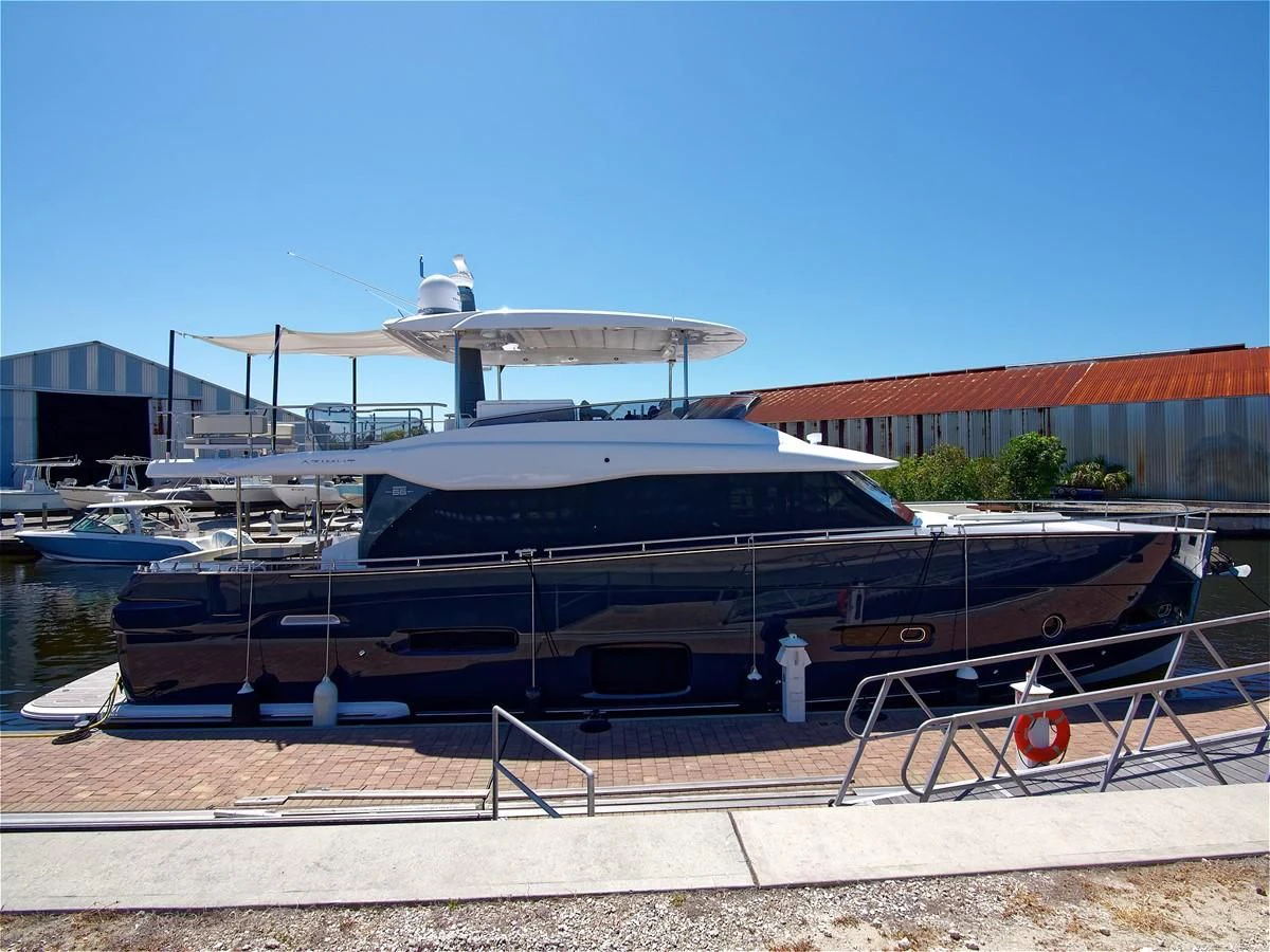 a black and white boat aboard 2017 AZIMUT 66 MAGELLANO Yacht for Sale