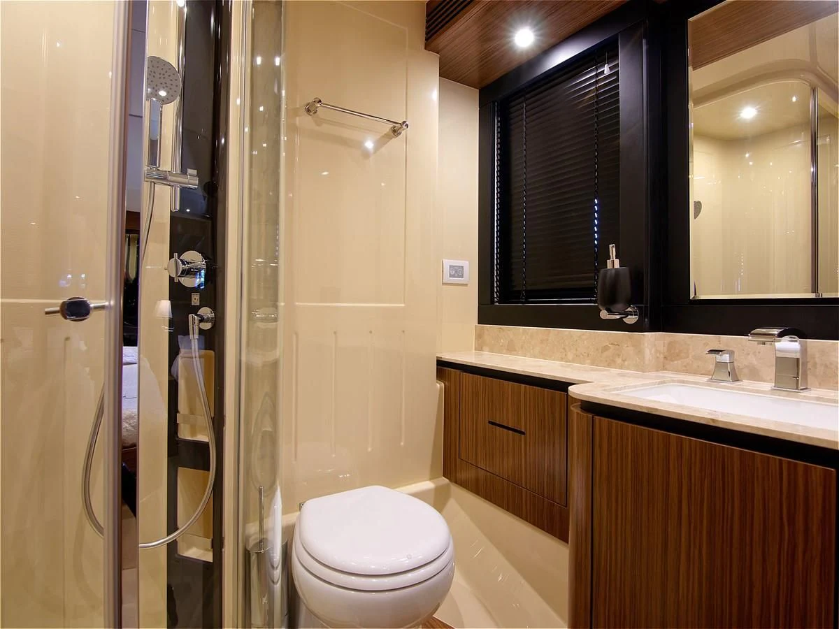 a bathroom with a glass shower aboard 2017 AZIMUT 66 MAGELLANO Yacht for Sale