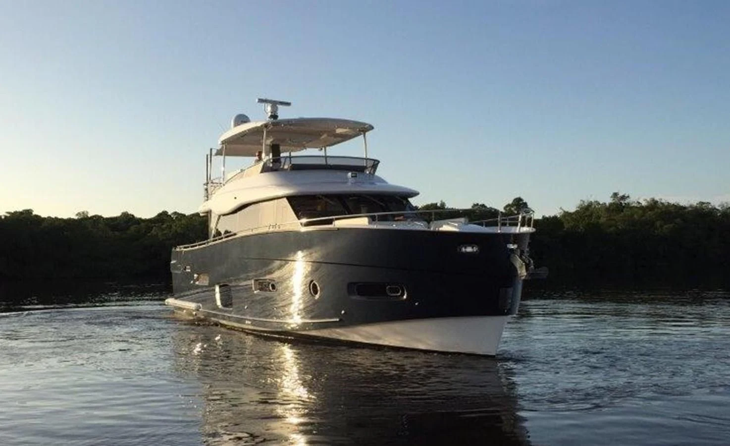 a boat on the water aboard 2017 AZIMUT 66 MAGELLANO Yacht for Sale