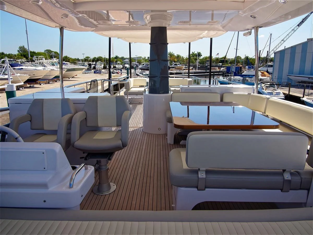 a boat with seats aboard 2017 AZIMUT 66 MAGELLANO Yacht for Sale