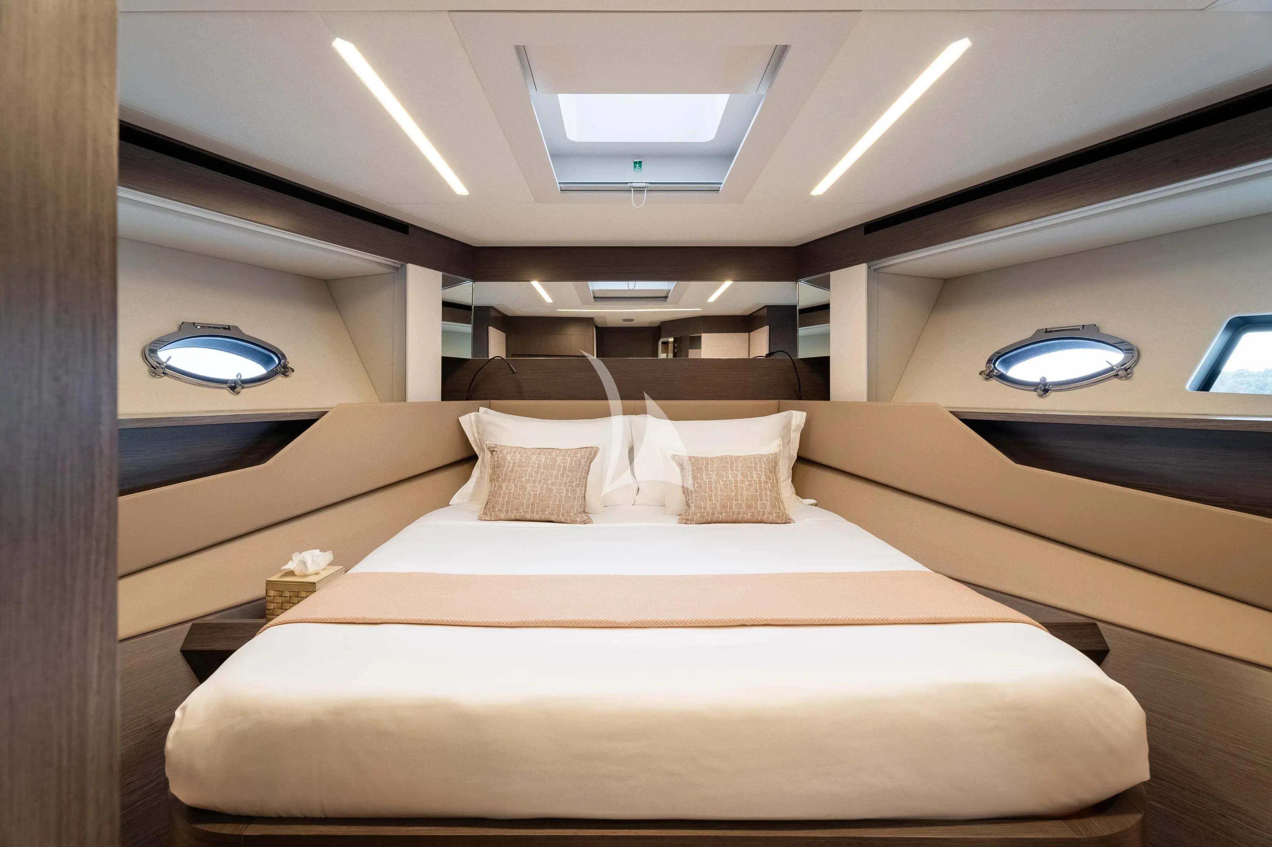 a room with a bed and a window aboard CHERRY Yacht for Charter