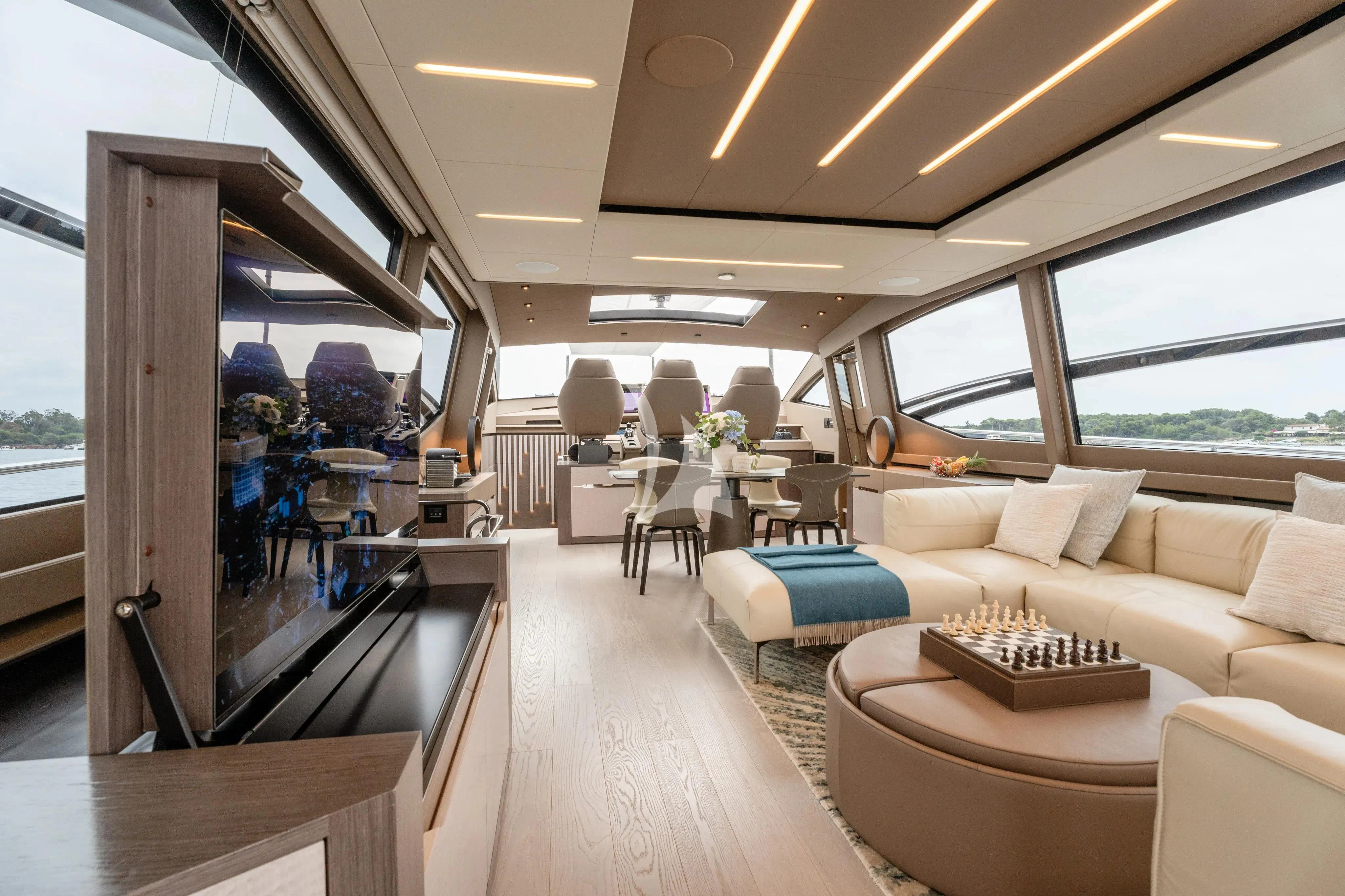 a living room with a large mirror aboard CHERRY Yacht for Charter