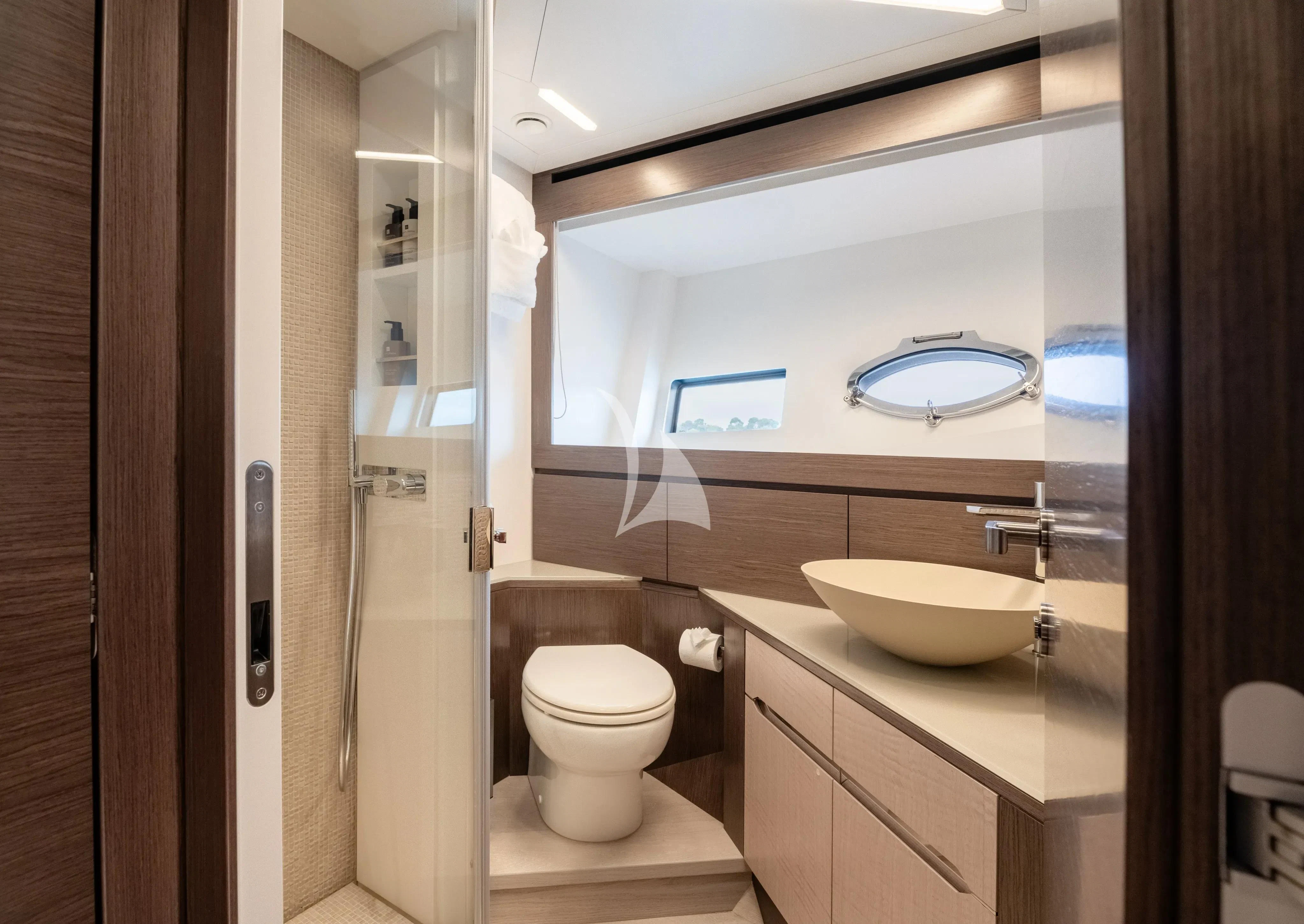 a bathroom with a sink and a toilet aboard CHERRY Yacht for Charter