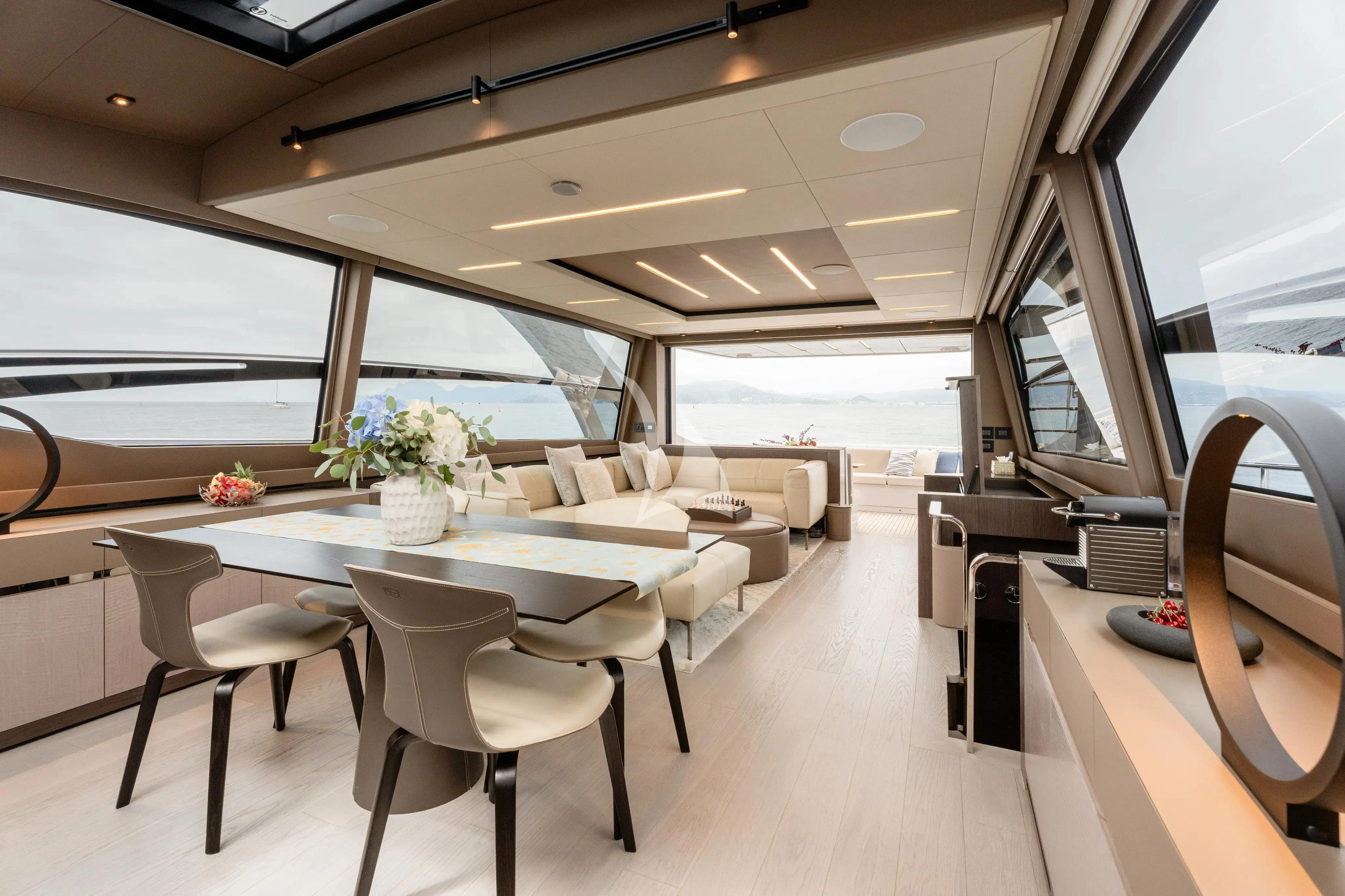 a room with a table and chairs aboard CHERRY Yacht for Charter