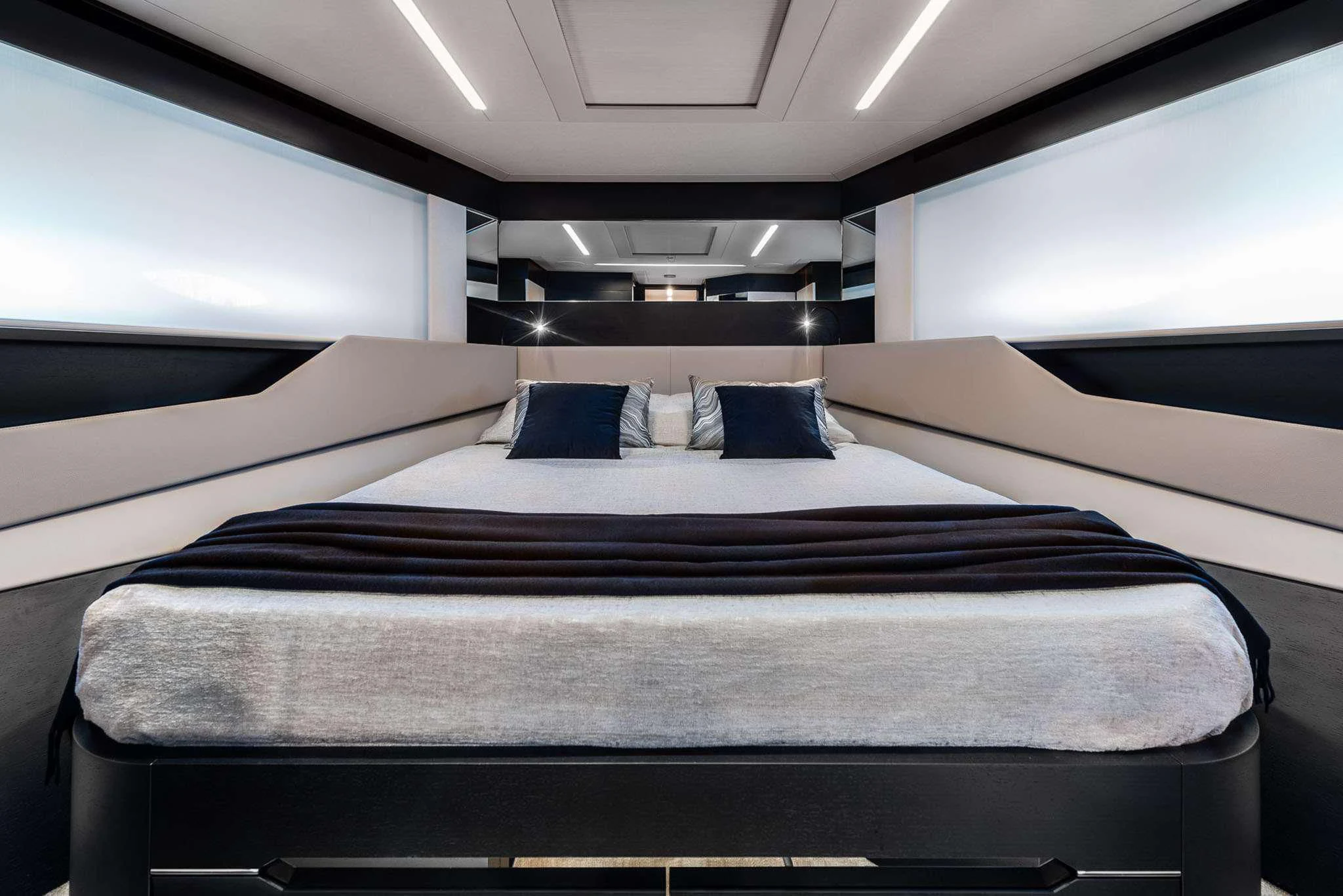 a bed in a room aboard CHERRY Yacht for Charter