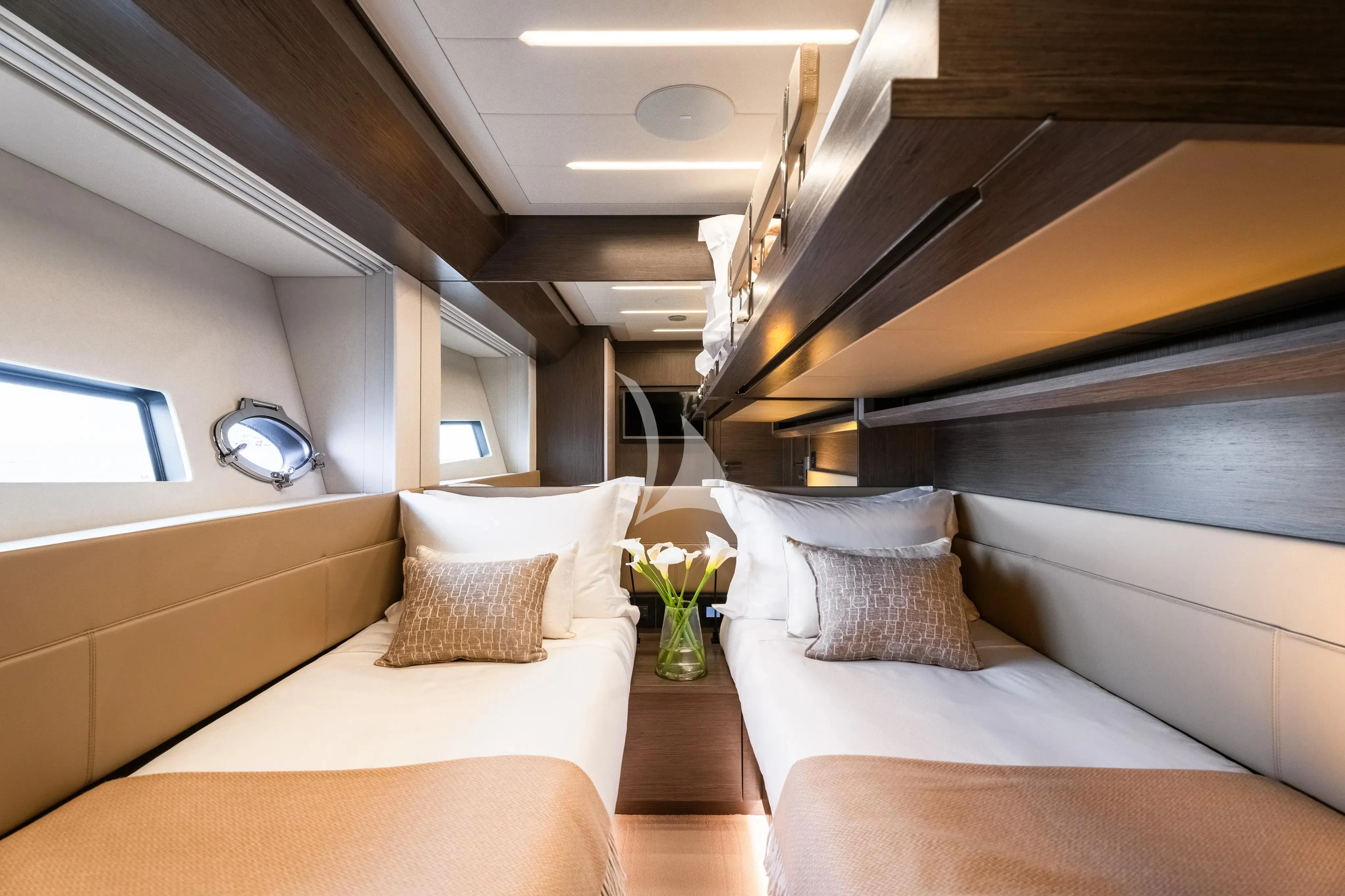 a room with a bed and a window aboard CHERRY Yacht for Charter