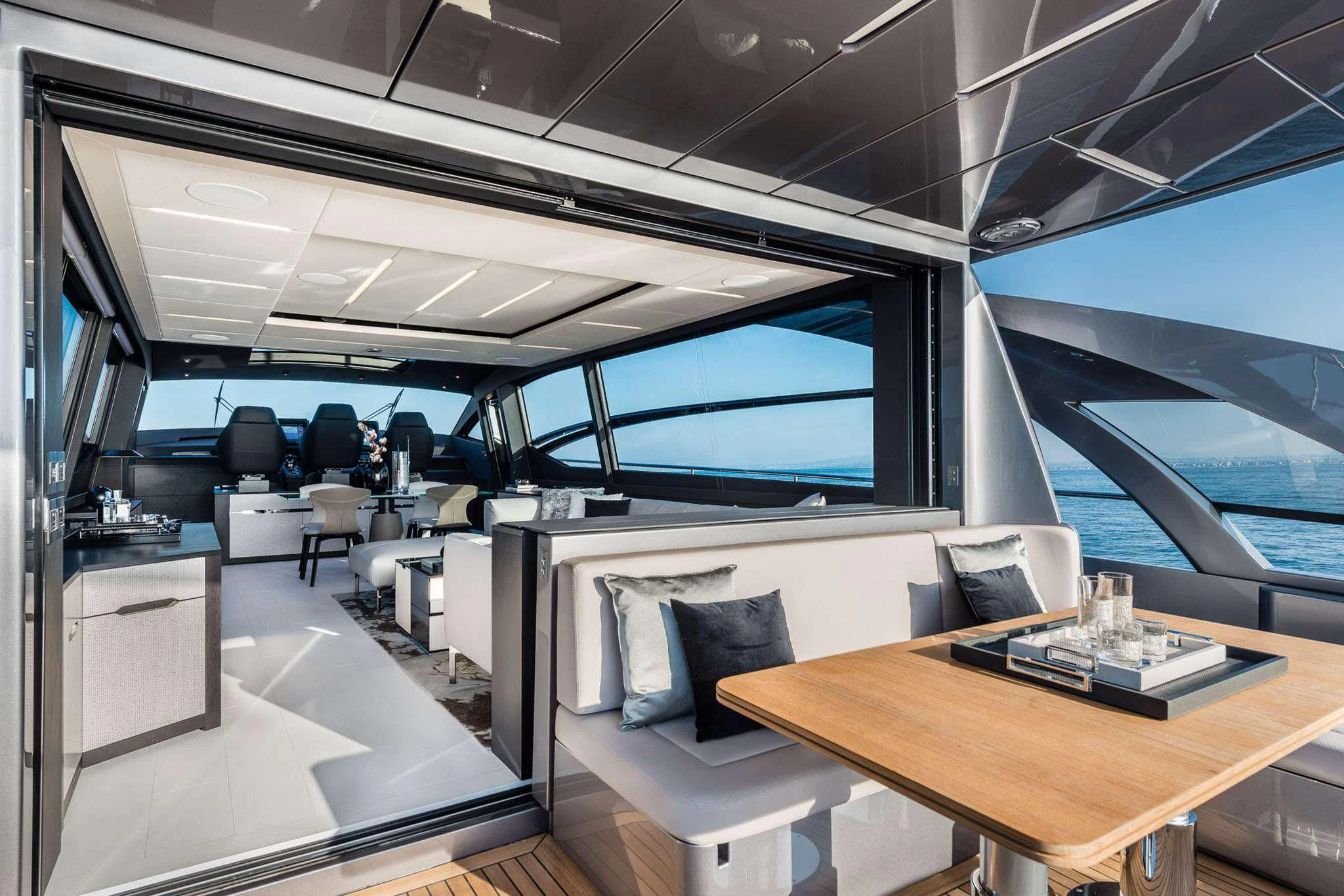 inside of a building with a table and chairs aboard CHERRY Yacht for Charter