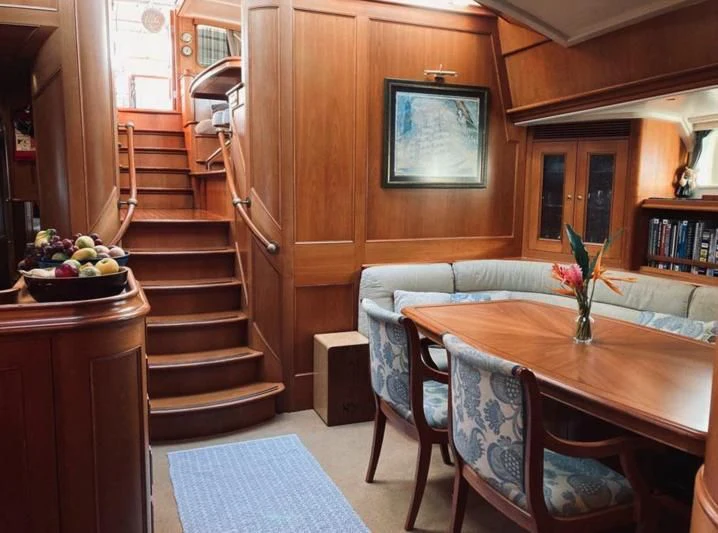 a dining table in a cabin aboard SWEET EMOTION Yacht for Sale