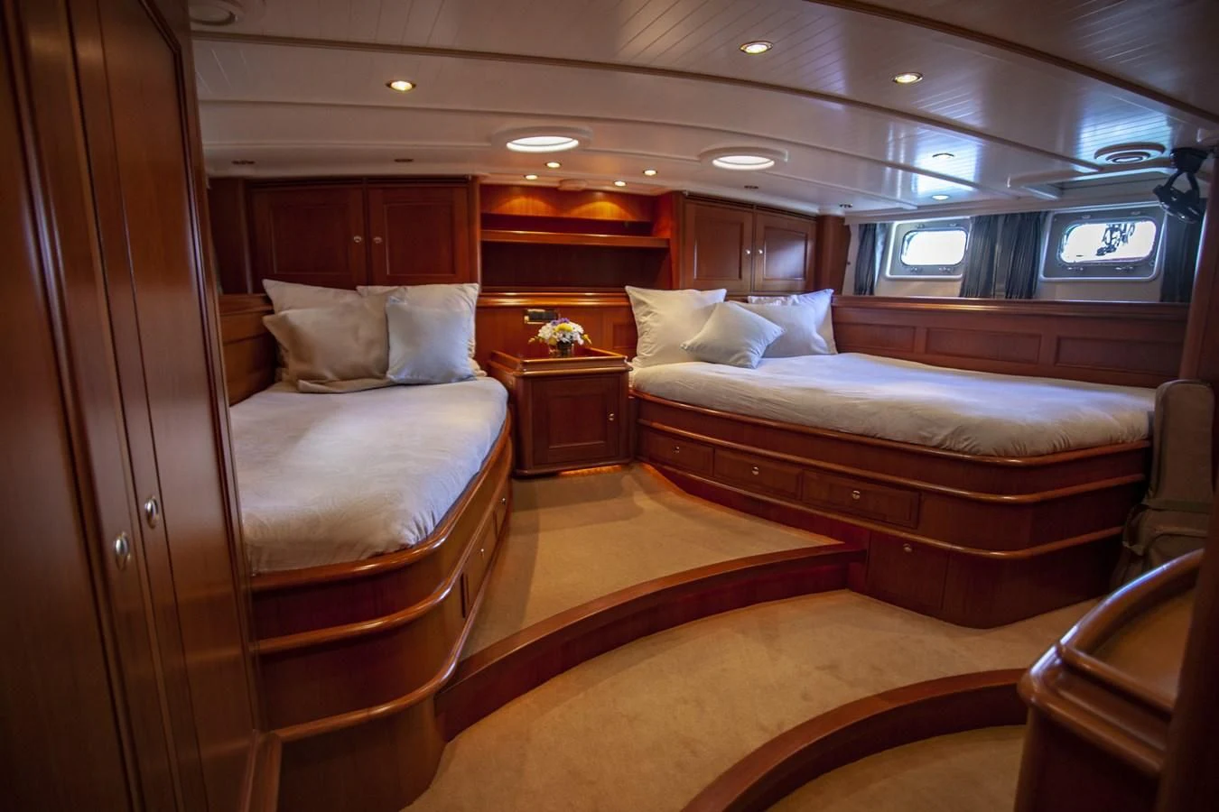 a room with a couple beds aboard SWEET EMOTION Yacht for Sale
