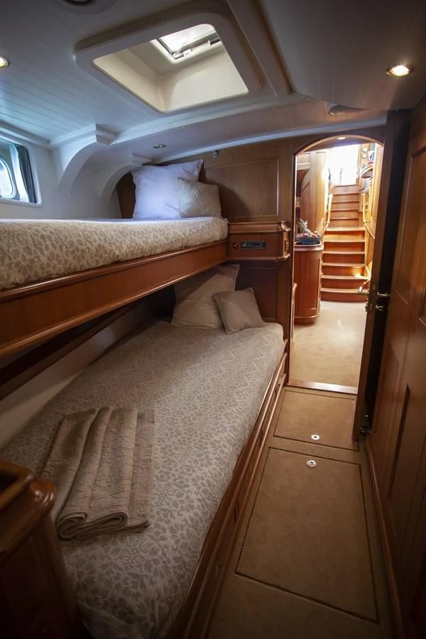 a bed in a room aboard SWEET EMOTION Yacht for Sale