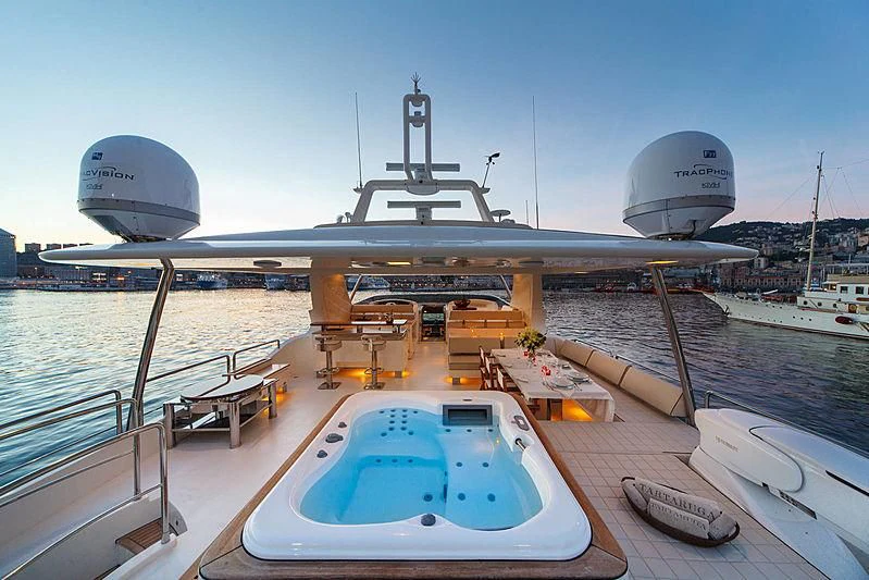 a large ship docked at a pier aboard TARTARUGA ONE 4J'S Yacht for Sale
