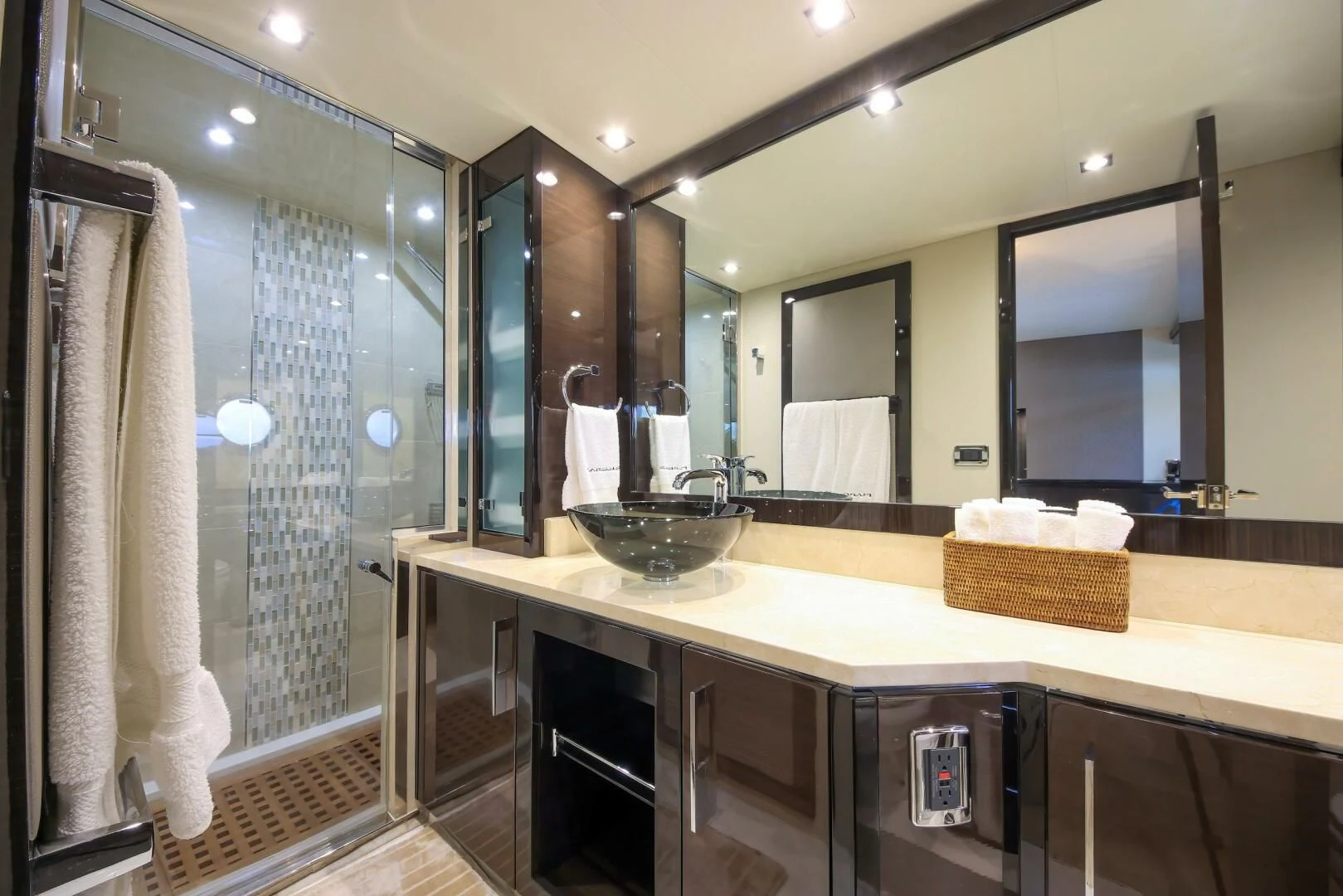 a bathroom with a large mirror aboard PARALOS Yacht for Charter