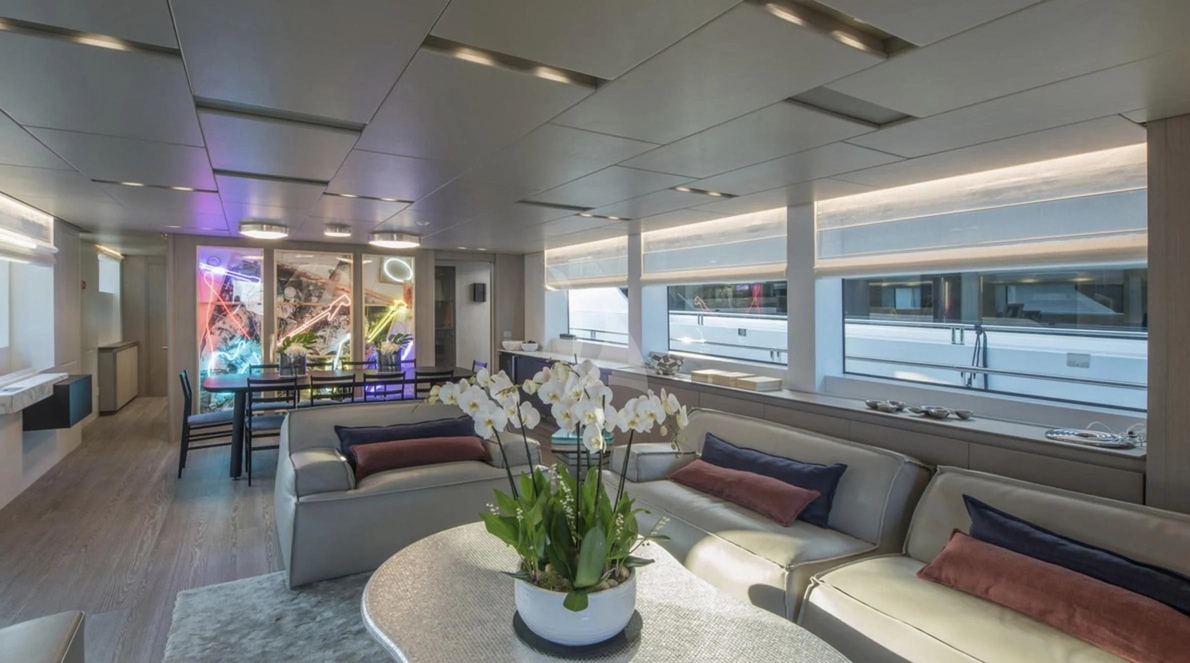 a living room with a large window aboard PARALOS Yacht for Charter