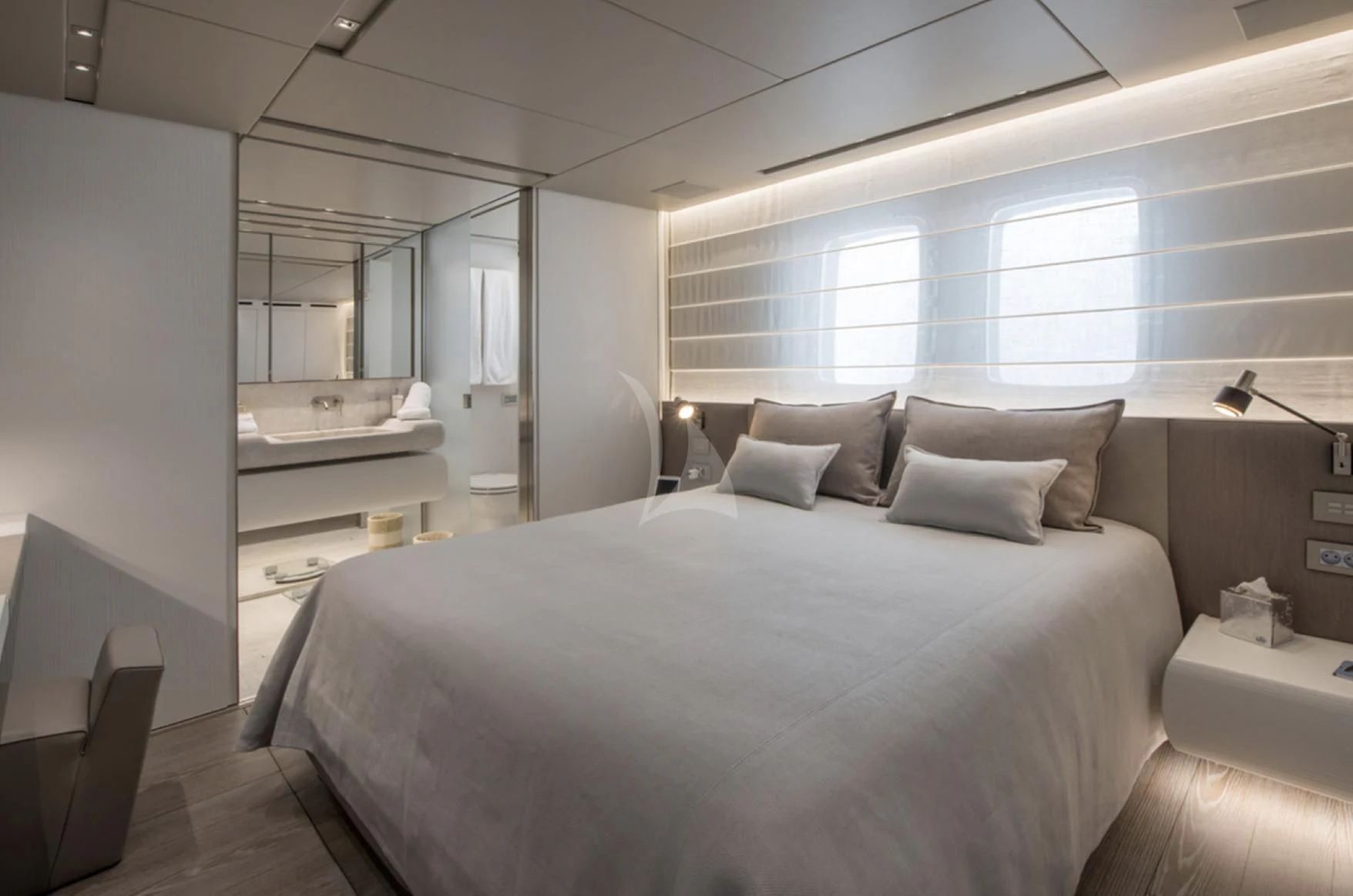 a bed in a room aboard PARALOS Yacht for Charter