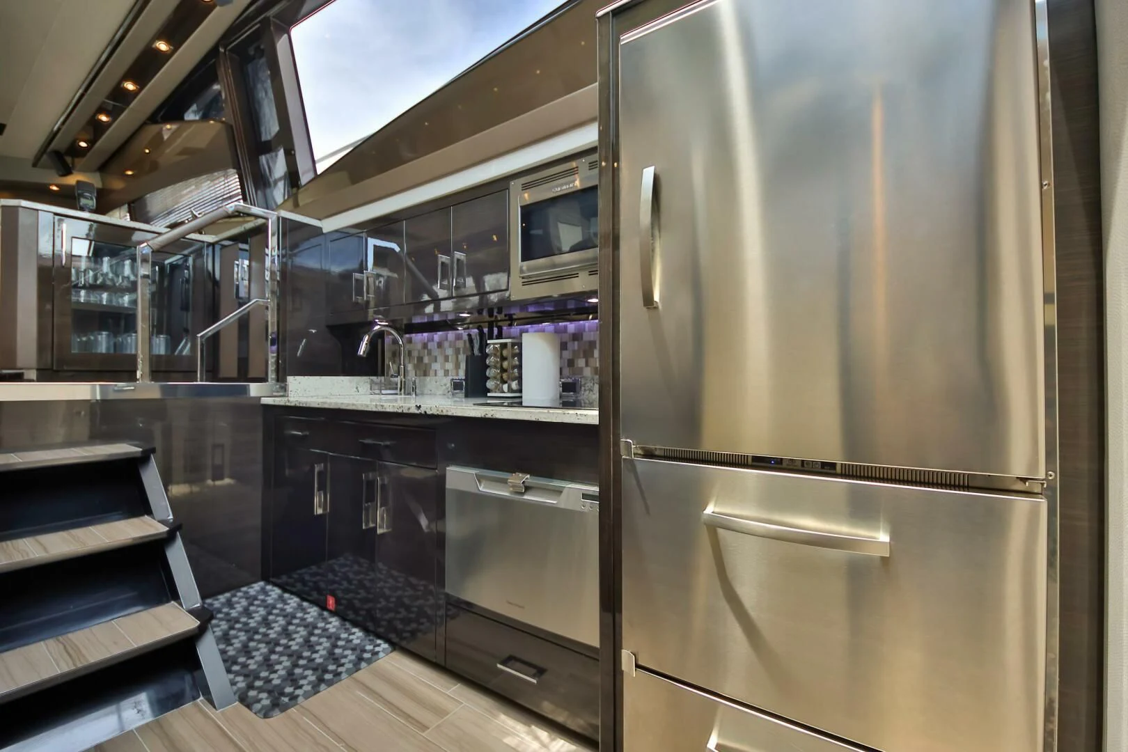 a kitchen with stainless steel appliances aboard PARALOS Yacht for Charter