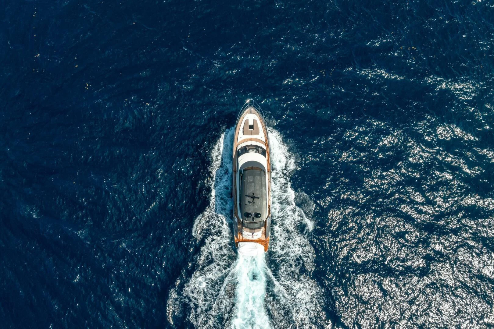 a space shuttle flying over a planet aboard PARALOS Yacht for Charter