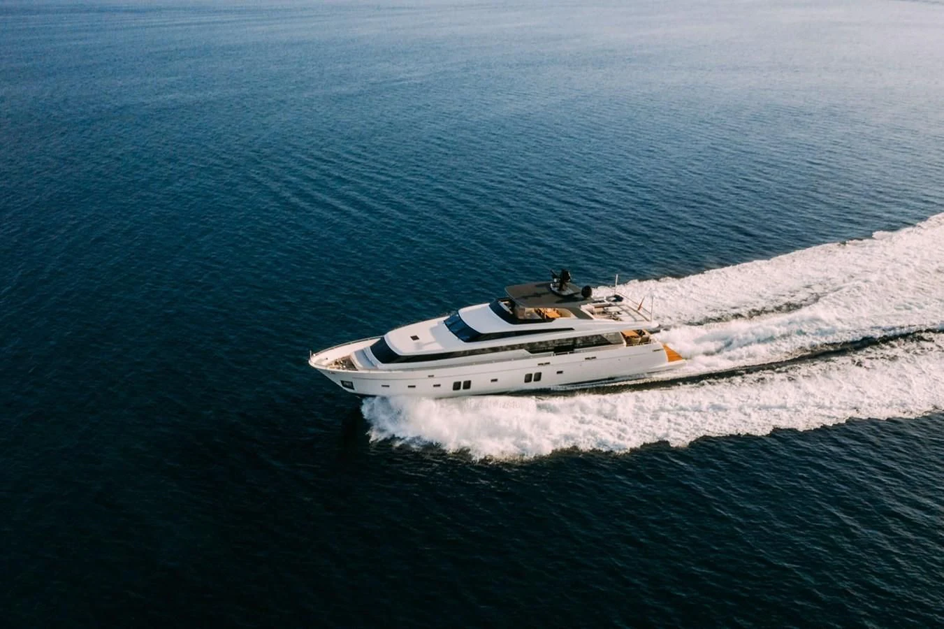 a white yacht on the water aboard PARALOS Yacht for Charter
