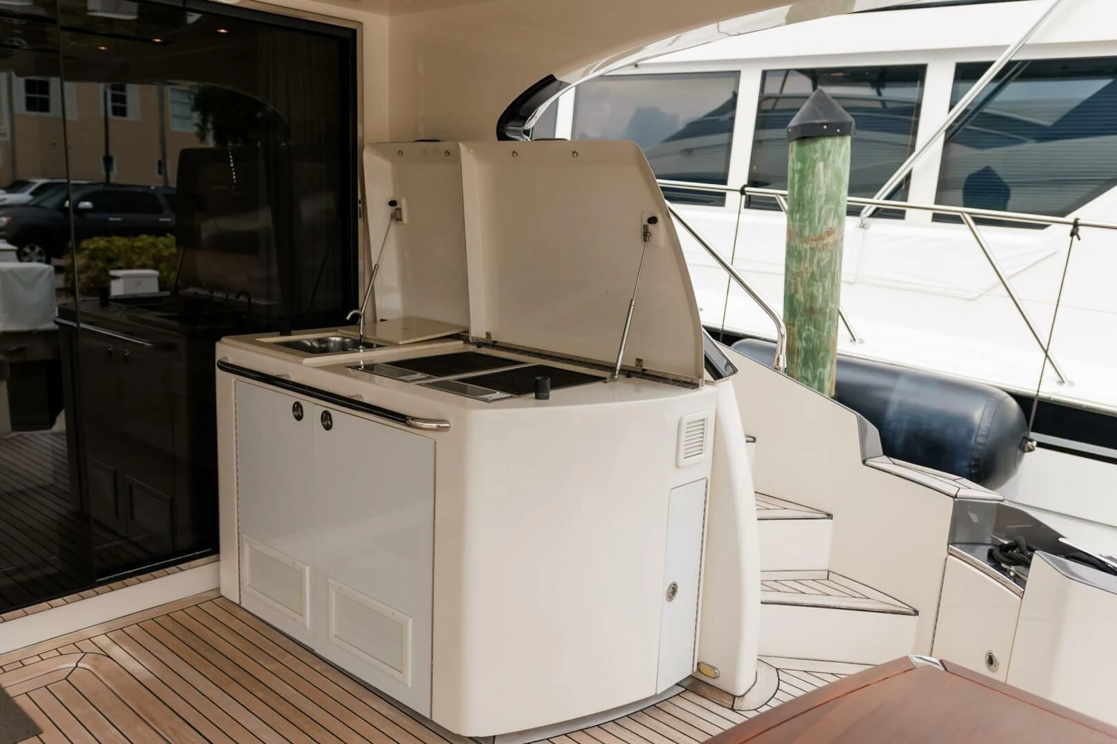 a white machine in a room aboard PARALOS Yacht for Charter