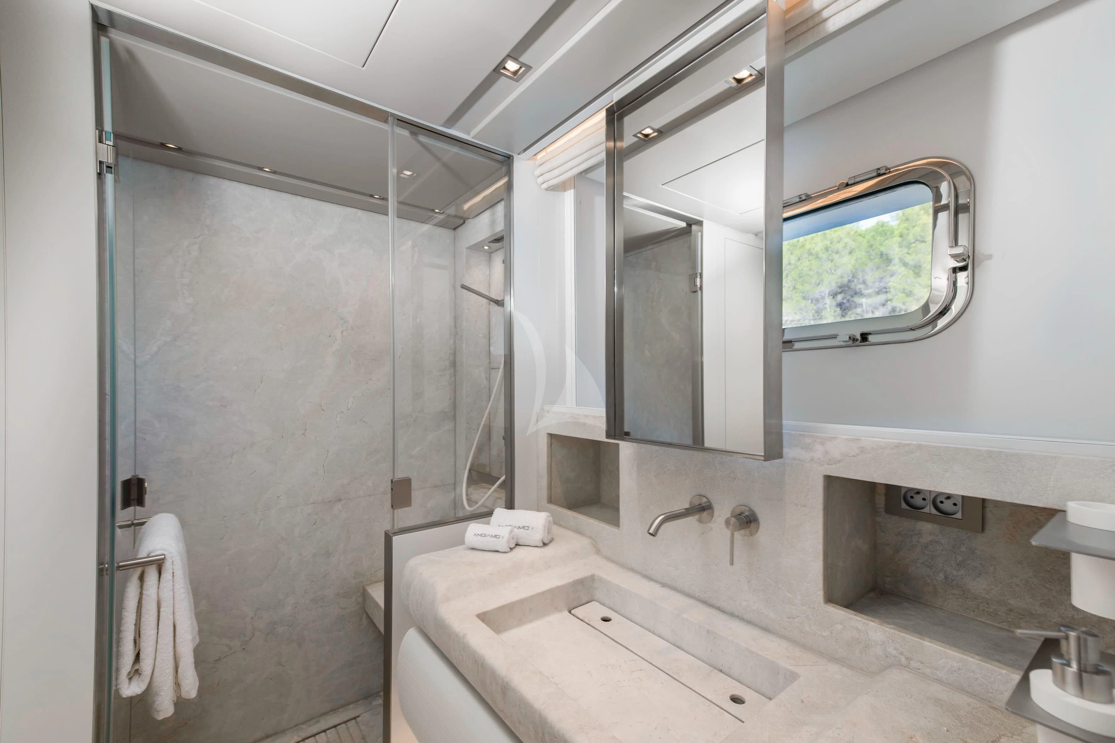 a bathroom with a large mirror aboard PARALOS Yacht for Charter