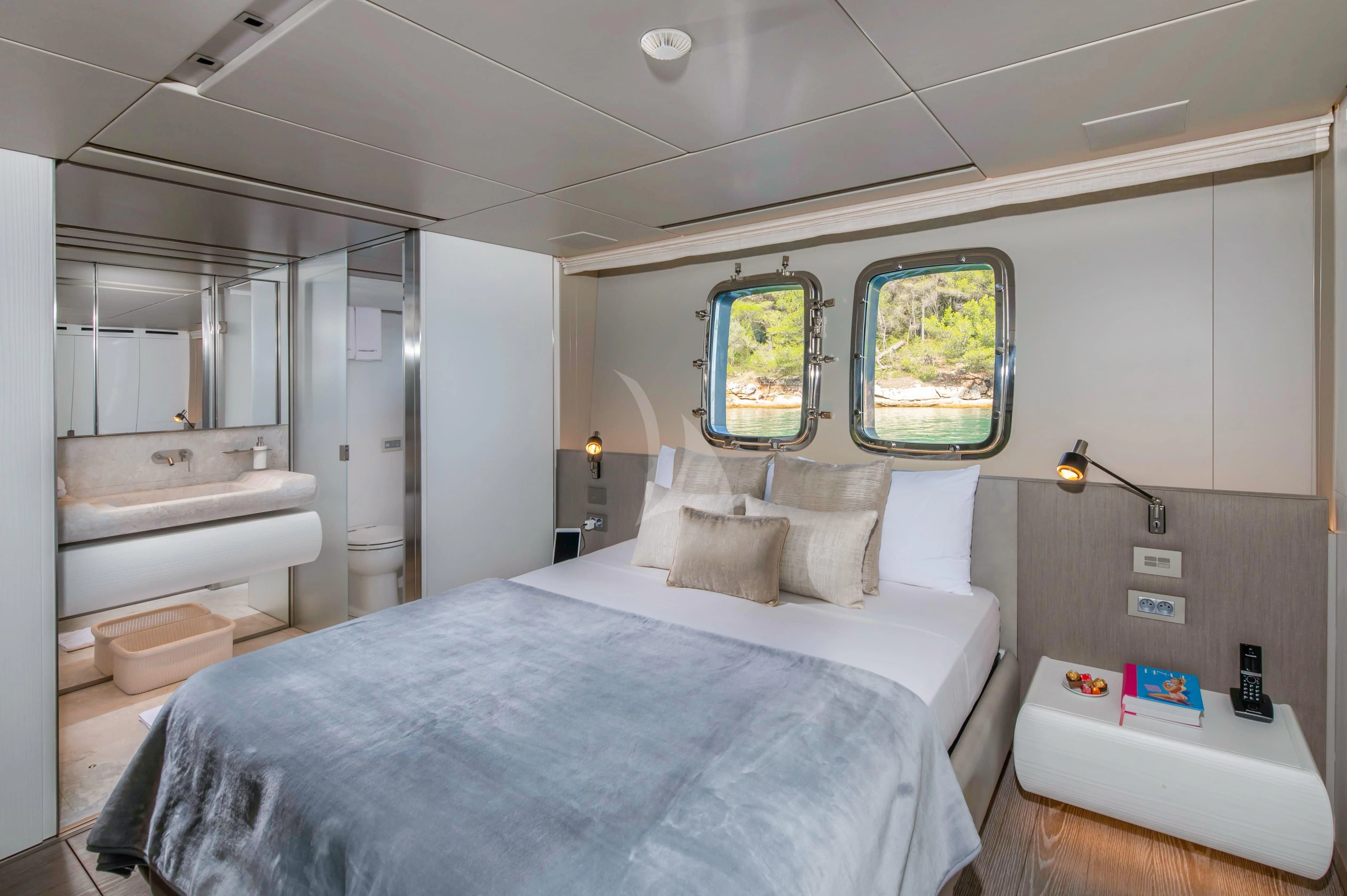 a room with a bed and a window aboard PARALOS Yacht for Charter