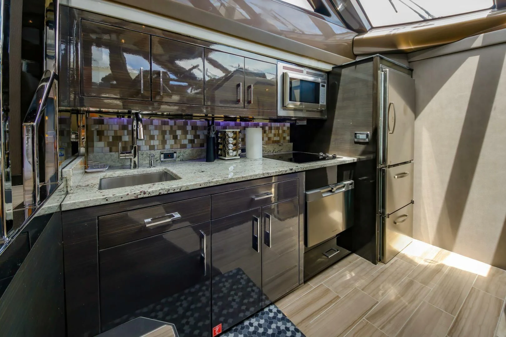 a kitchen with a large counter aboard PARALOS Yacht for Charter